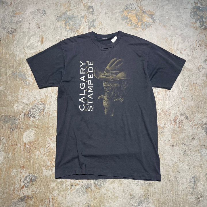 古着 94's USAVINtage / カルガリー・スタンピード / ロデオイベント / カナダ・アルバータ州カルガリー / ヴィンテージ シングルステッチ イベントTシャツ / サイズXL相当