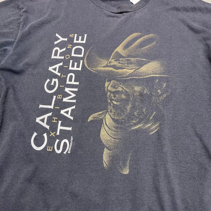 古着 94's USAVINtage / カルガリー・スタンピード / ロデオイベント / カナダ・アルバータ州カルガリー / ヴィンテージ シングルステッチ イベントTシャツ / サイズXL相当