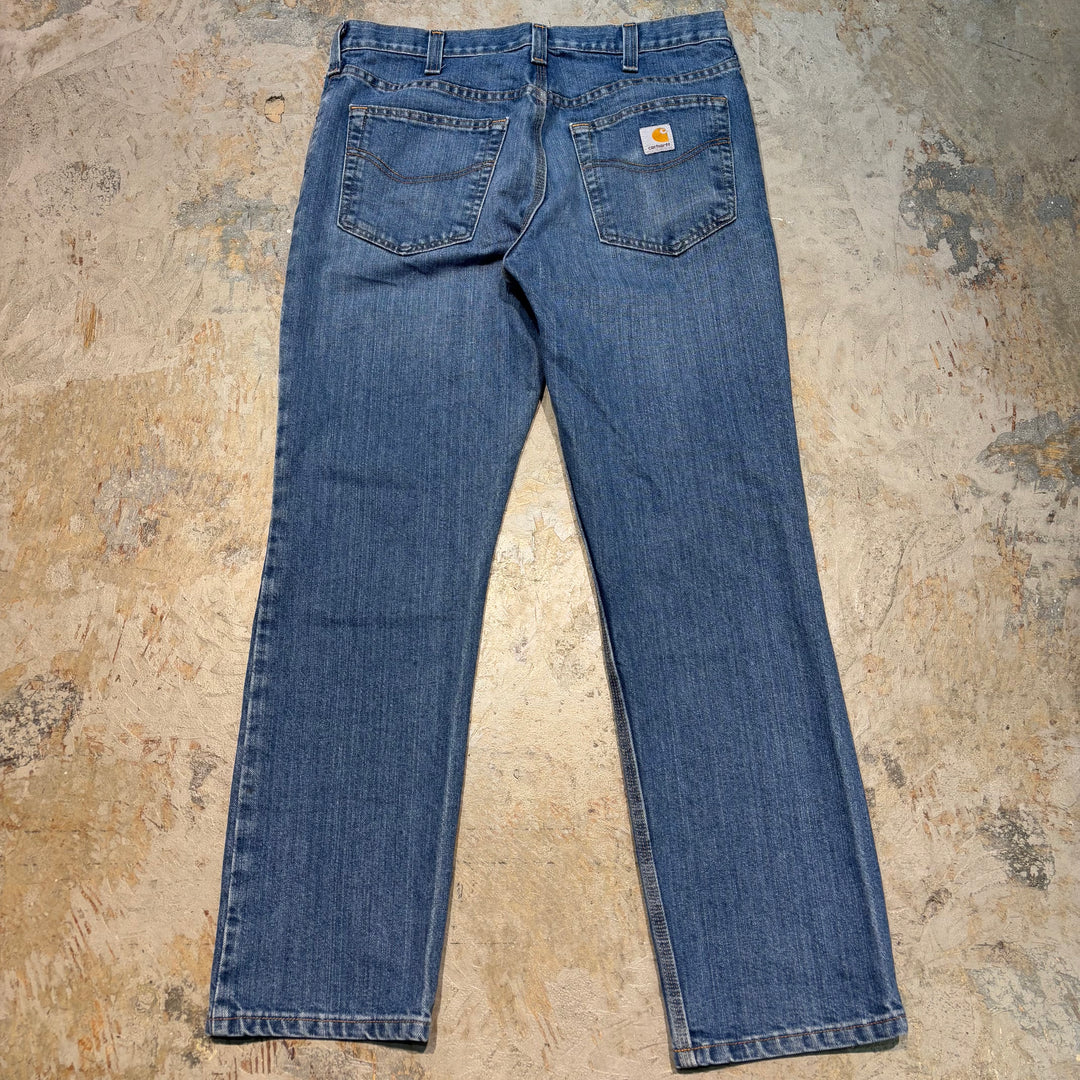 Used clothing Carhartt/ Denim pants/ Actual size 33 x 29