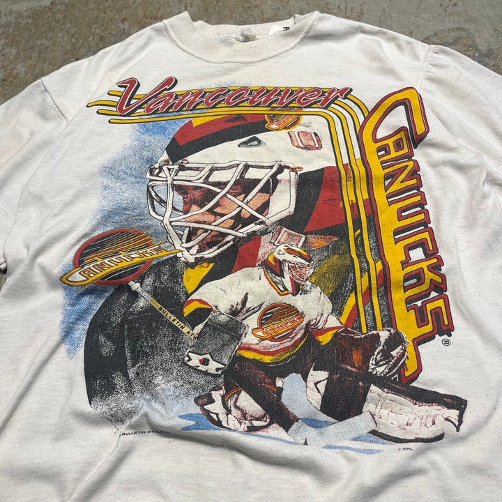 古着 バンクーバー･カナックス/ホッケーチーム/NHL/ヴィンテージ シングルステッチ プリント Tシャツ/サイズM-L相当